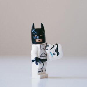 a lego storm trooper has removed his helmet to reveal he is Batman, this is a placeholder image for products