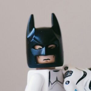 a lego storm trooper has removed his helmet to reveal he is Batman, this is a placeholder image for products